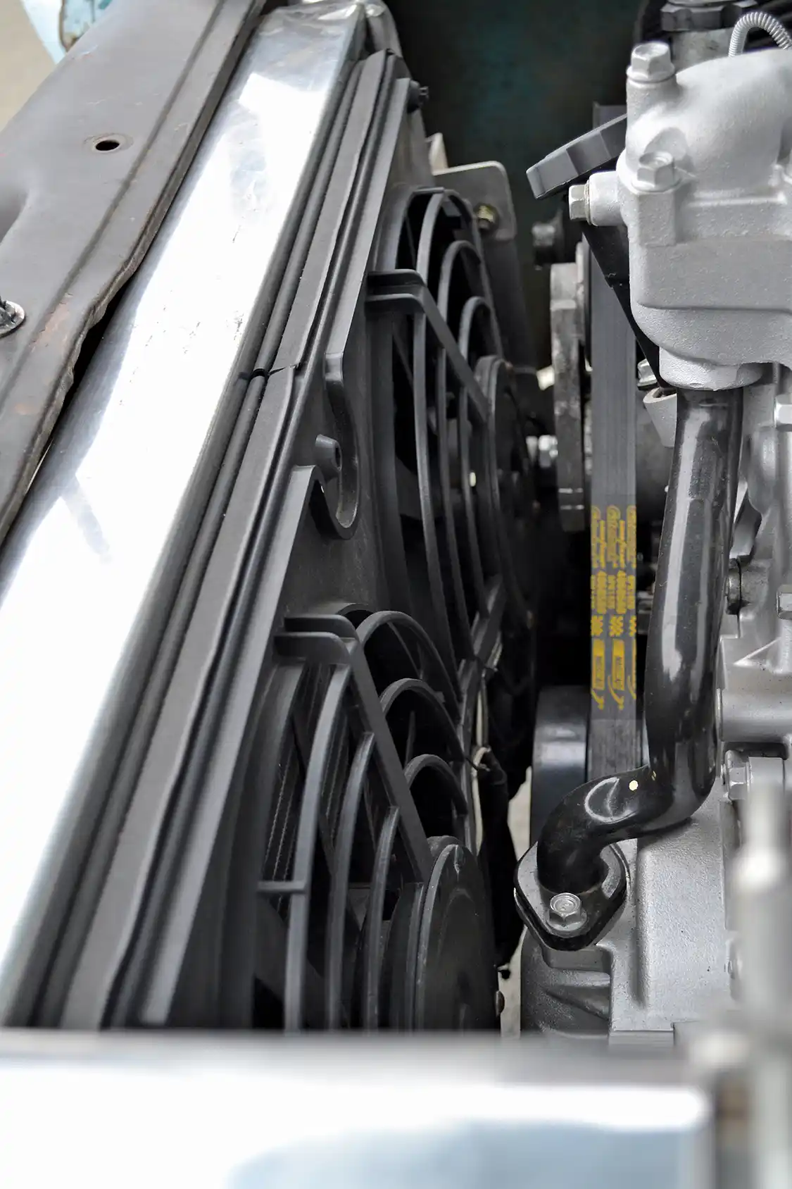 An aluminum radiator designed for a Big Block Chevy performs the cooling duties, along with twin electric fans. Bill reports that the engine "Doesn't get hot, anywhere, ever," which he noted was a perfect feature for a parts-hauling truck.