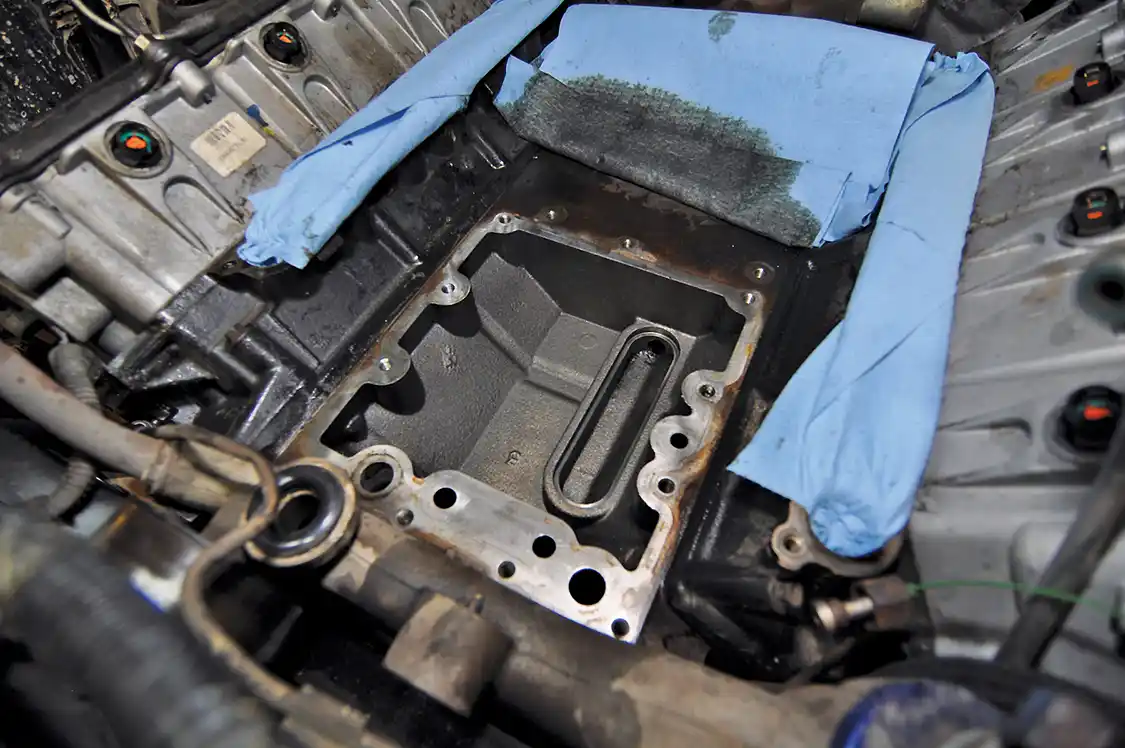 7. After removing it, Wamsley spent some time cleaning the engine valley until it was “surgically clean.” The rags are there to make sure nothing accidently falls into the engine intake. If that were to happen, the head—or heads—would most likely have to be removed.