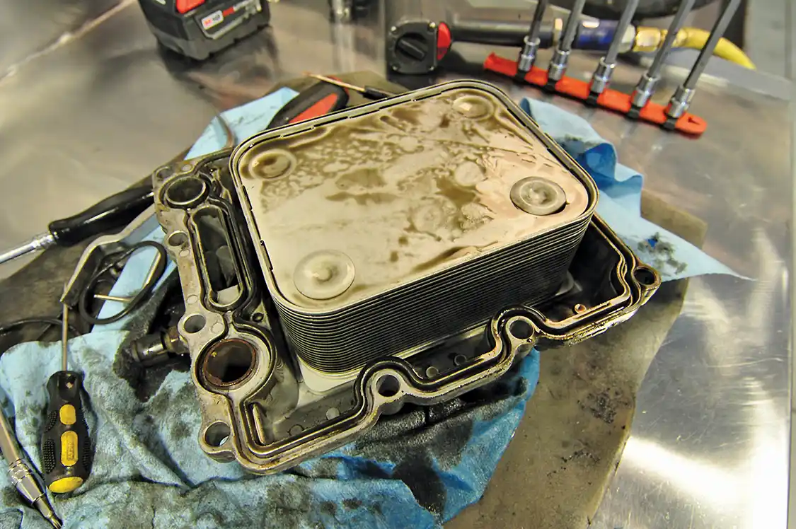9. Here’s the factory oil cooler found bolted to the bottom of the assembly.