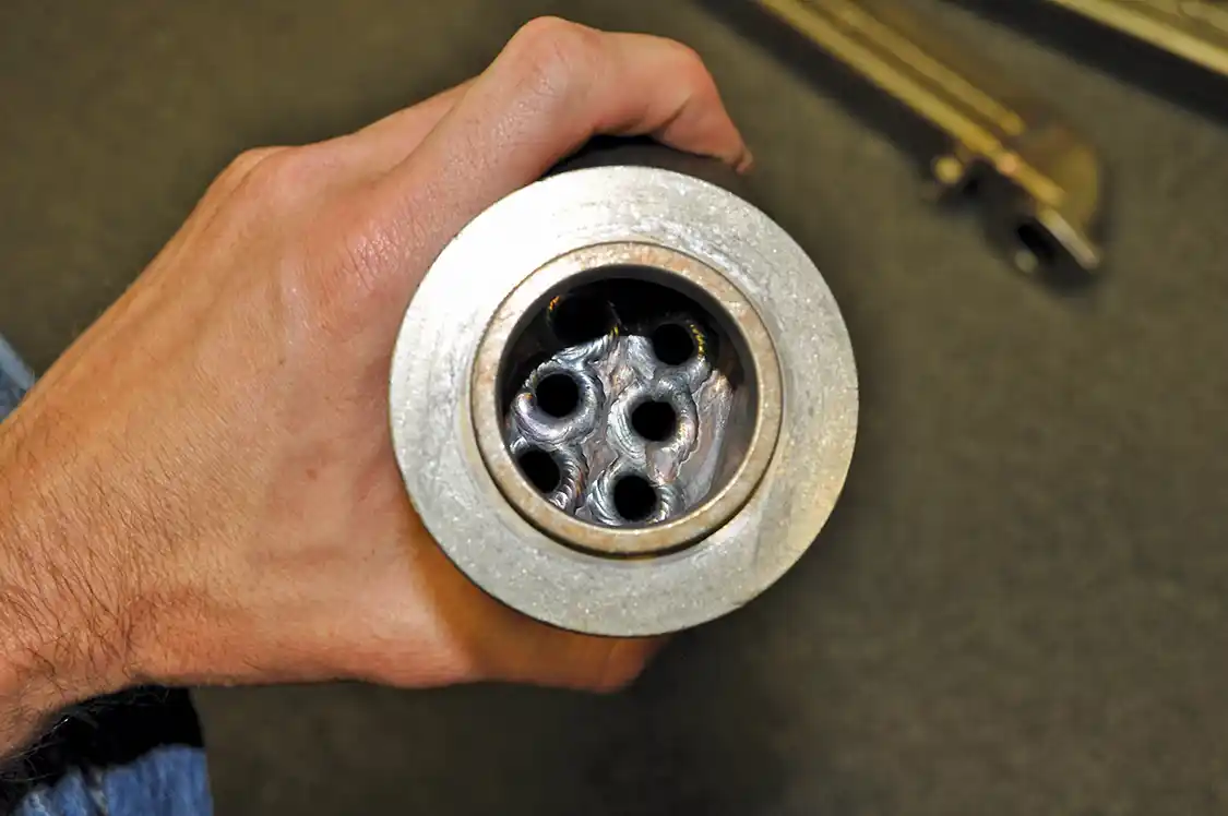 15. The factory unit (NOT pictured here) is a stacked heat exchanger design much like the oil cooler. The passageways are very narrow and can fail easily sending coolant into the cylinders. If it leaks badly enough, it can bend a rod or worse. Bullet Proof Diesel’s EGR cooler (seen here) uses 6 welded stainless steel tubes jacketed with coolant to lower EGT’s into the intake. It’s a much, much stronger unit.