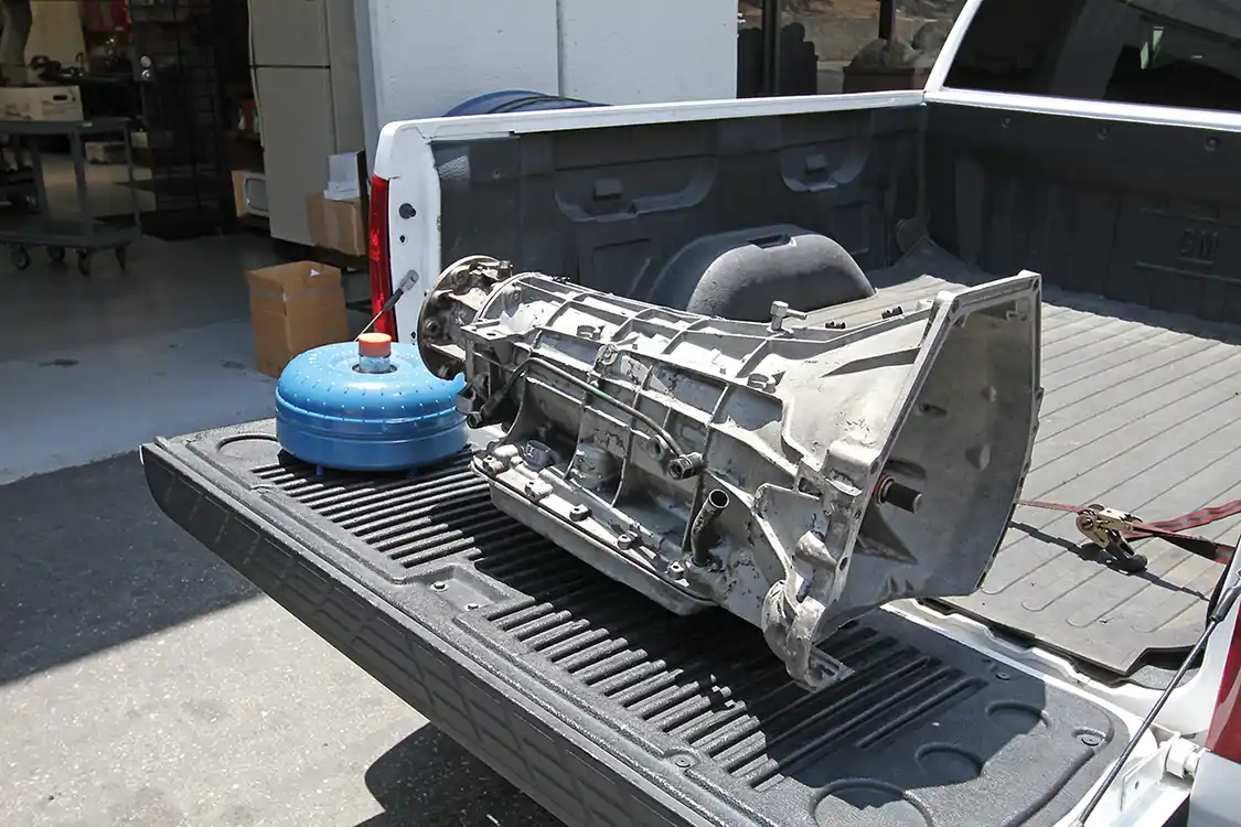 After a complete overhaul and some much needed upgrades by Remac, our better than new Ford 4R100 transmission is ready to install. Remac ships its transmission with a torque converter. 
