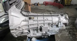 2. The basic transmission will need to be bolted to the transfer case for our 4x4 Ford.