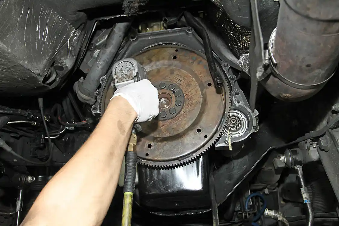5. The flex plate is bolted to the ended of the crankshaft flange, after the starter adapter ring is installed.