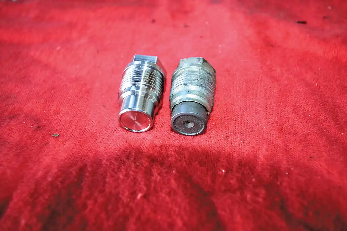 3. Here’s the solid stainless steel PPE affordable fueling upgrade unit on the left compared to the stock unit that is known to bleed off fuel pressure, causing check engine lights and diminished performance under WOT.