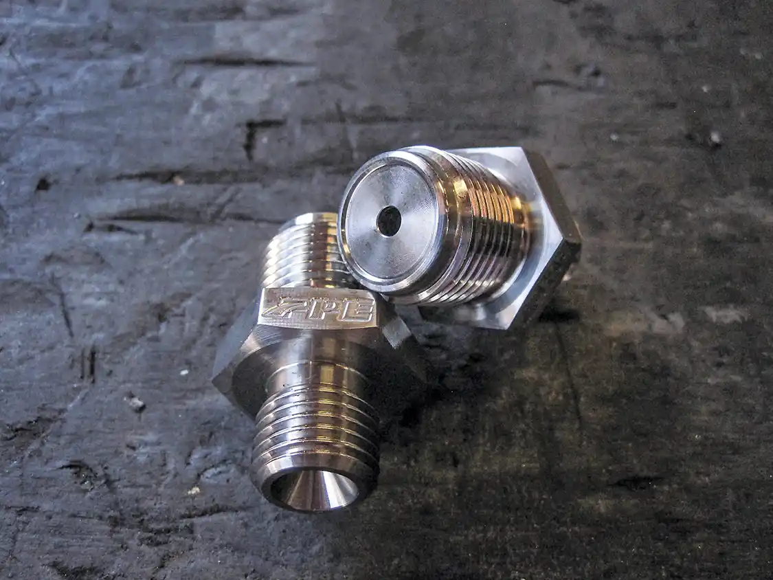 7. Unlike the OEM fuel rail fittings that feature pinhole-sized fuel feed holes, the PPE ported units are visibly larger to feed a pumped-up Duramax all the fuel it needs. Plus they’re cheap: $34.99.