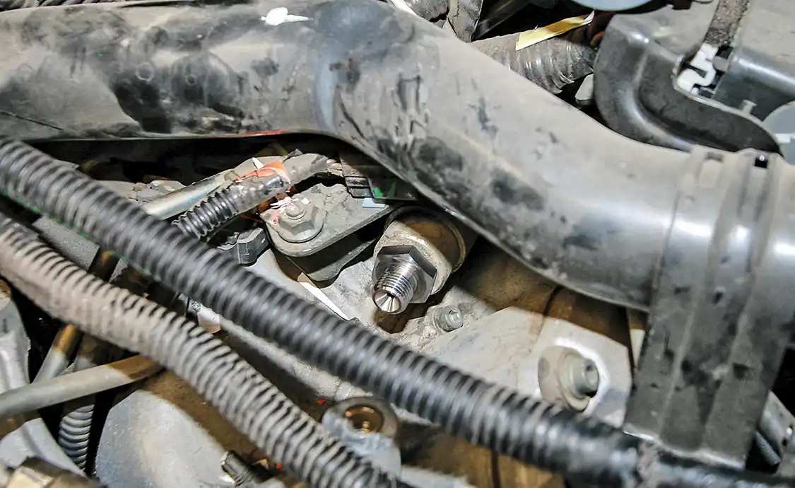 11. Be careful when performing the install, as you don’t want to strip the factory fuel rail; it’s a pain to remove.
