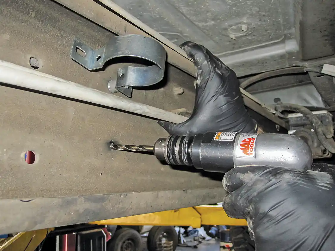 18. Barker decided to mount the compact pump inside the frame rail where it would be easily accessible and protected from the environment during heavy off-roading.