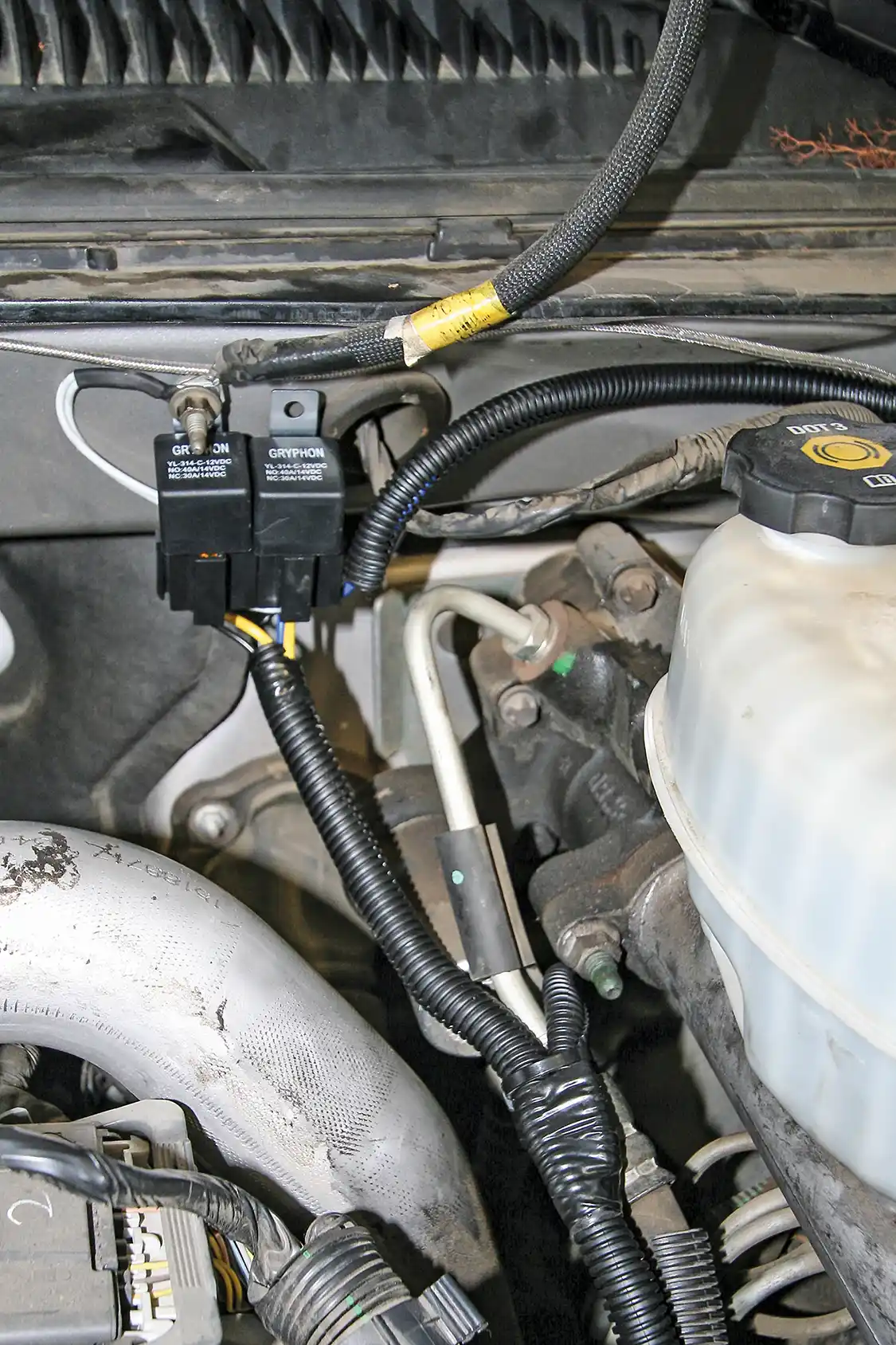 24. Note the tidy wiring install with loom, electrical tape and all. The more initial time you spend on the wiring, the better, since having to undo and redo messy wiring is a bear.