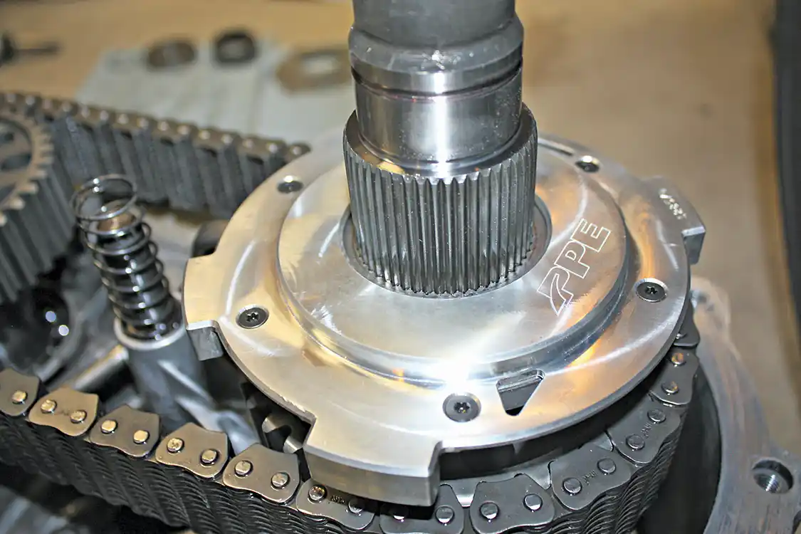 1. The PPE Pump Upgrade Kit (shown installed here) replaces the factory style pump housing and uses much thicker tabs to hold it in place in the outer transfer case shell. The factory unit is prone to rubbing through the case creating a leak that can lead to major damage and complete failure of the transfer case.