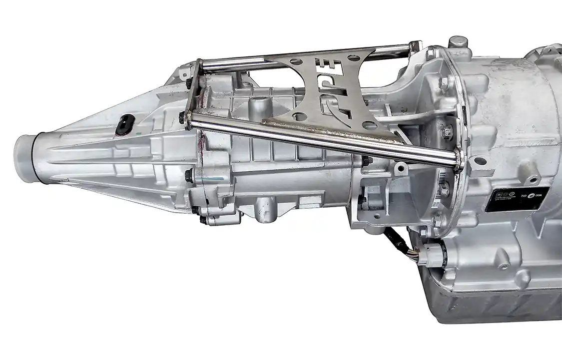26. The four-wheel drive Allison equipped GM trucks that see the abuse from off-roading, drag racing, and/or even the slightest driveline vibrations (bad u-joint, bent driveline, etc.) for too long might see premature cracks develop in the tail shaft housing of the transmission. This is usually due to the weight of the unsupported transfer case hanging off the back of that tail housing. To help prevent expensive failures, the PPE Transfer Case Brace helps distribute the weight of the transfer case to the transmission’s stronger center section and offer additional rigidity to the drivetrain.
