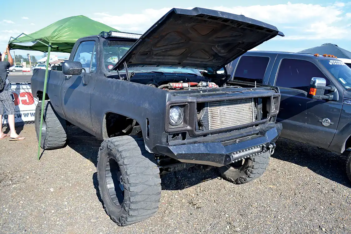 After the sled pulls, we took a quick tour around the pits to see if there was anything of interest. As it turns out: there was. This Cummins-swapped <a href="https://www.chevrolet.com/">Chevy</a> didn’t only have the diesel power train upgraded, but both front and rear axles and suspensions were upgraded as well for extra abuse. At 5,500 pounds, it's also a good 1,000 pounds lighter than most diesels.
