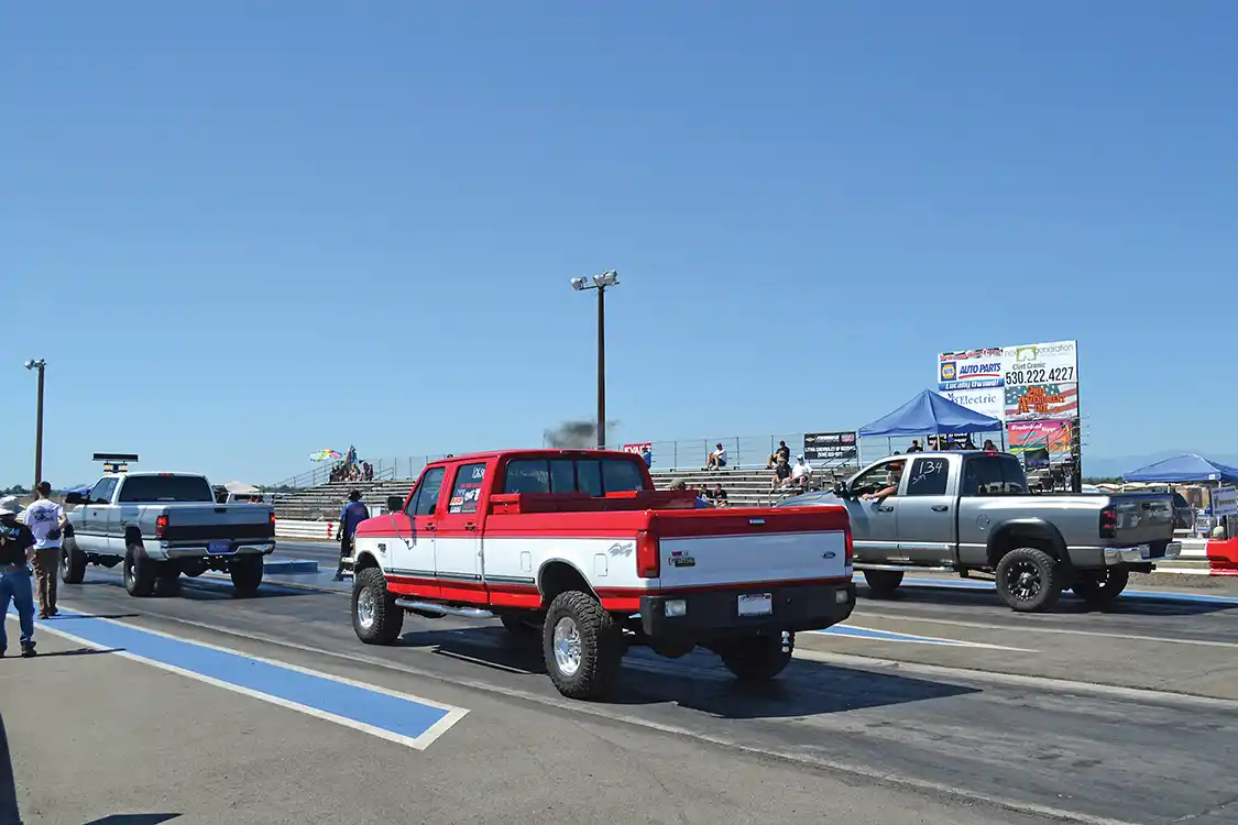 One of the cleaner and faster OBS <a href="https://www.ford.com/">Fords</a> in attendance was this two-tone red and white rig, which made pass after pass in the 13-second zone, and even competed in the sled pull later in the day.