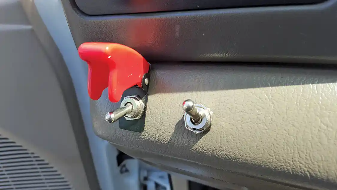 2. A small arming switch can be used to activate a water-methanol system manually, and can often be placed in an unassuming spot, like the bottom of a dash.