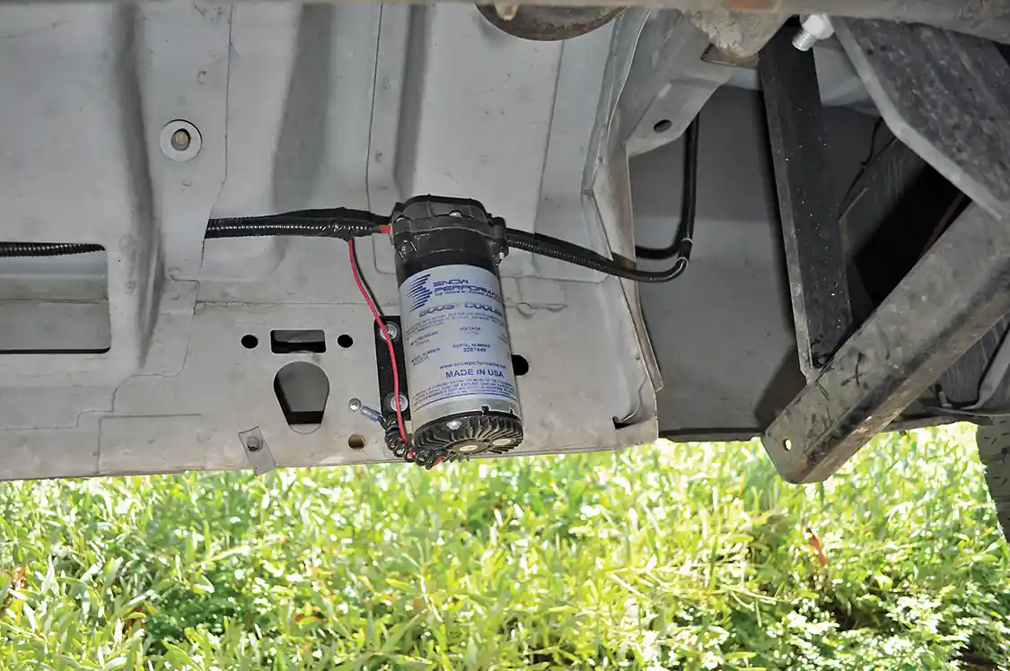 5. One of the main components to a water-methanol system is the high-pressure pump, which creates about 200 to 300psi on street-style kits. It should be mounted below the tank and as close to it as possible.