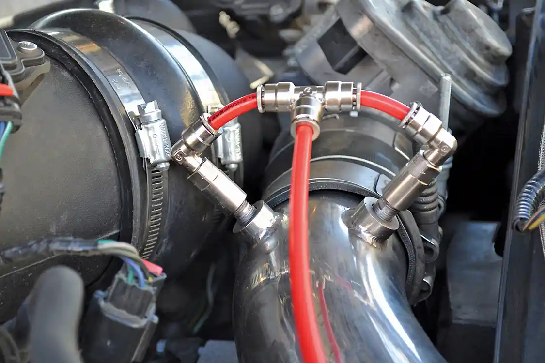 6. Nozzles are usually mounted in the intake post-turbo, and can even be disguised fairly well. Most hot street performance systems use two large nozzles, such as these two 625 ml/min units from Snow Performance.