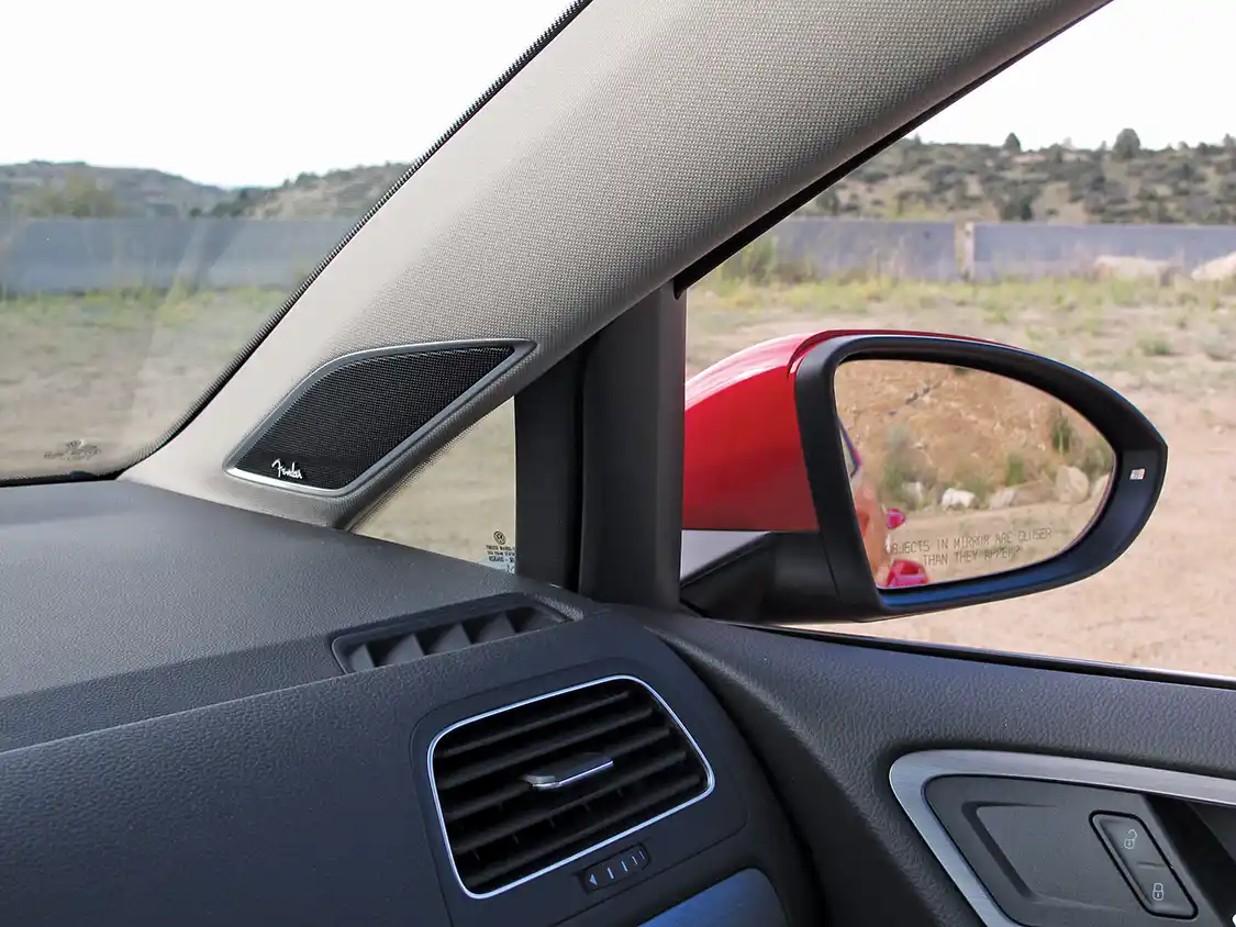 The 2015 Golf Sportwagen has an odd triangular window right over the dash at the A-pillar. This helps see what would be hiding in a blind spot if the glass weren’t there. In addition, we found it a great place to store your sunglasses.