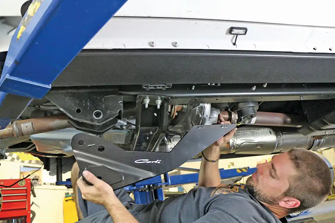 8. Before the new Carli front suspension arms can be installed, the drop down bracket must be installed on the frame.a