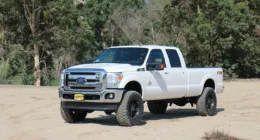 Seen here is a stock F-250 (top). Here's the same truck with a Carli Suspension Dominator 3.0 kit (bottom).