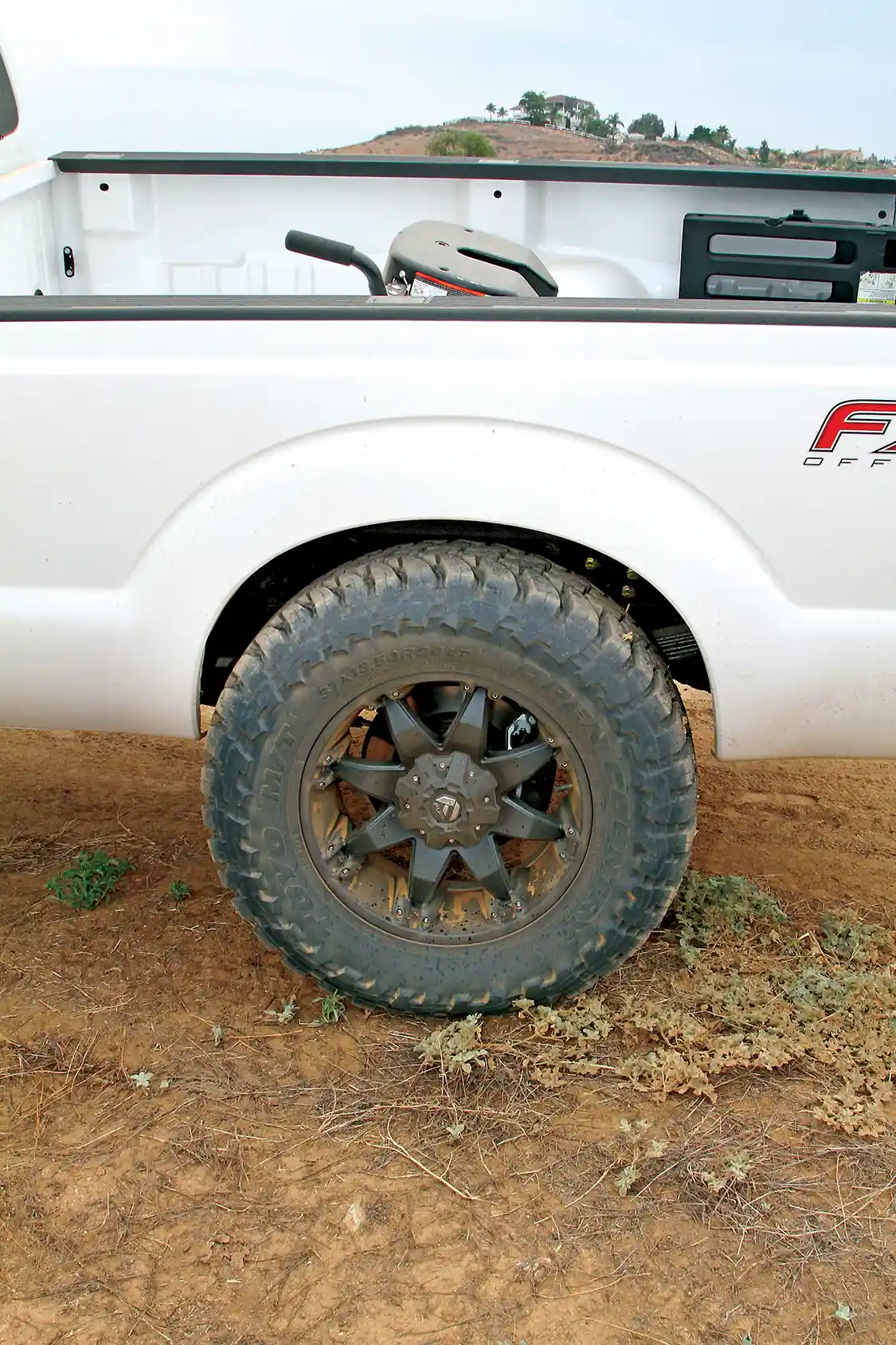 18. This <a href="https://www.toyotires.com/">Toyo</a> Open Country AT 37x13.5R20LT fills the rear wheel opening and looks cool mounted on a <a href="https://www.fueloffroad.com/">Fuel Offroad</a> 20x9 Octane wheel. Here the suspension on this side is against the rear bump stops. At normal ride height, there’s even more clearance around this huge tire.