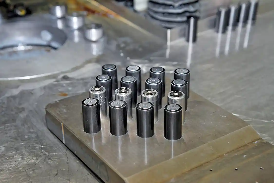 8. This fixture accepts up to 16 common-rail injector nozzles at a time for Abrasive Flow Machining.