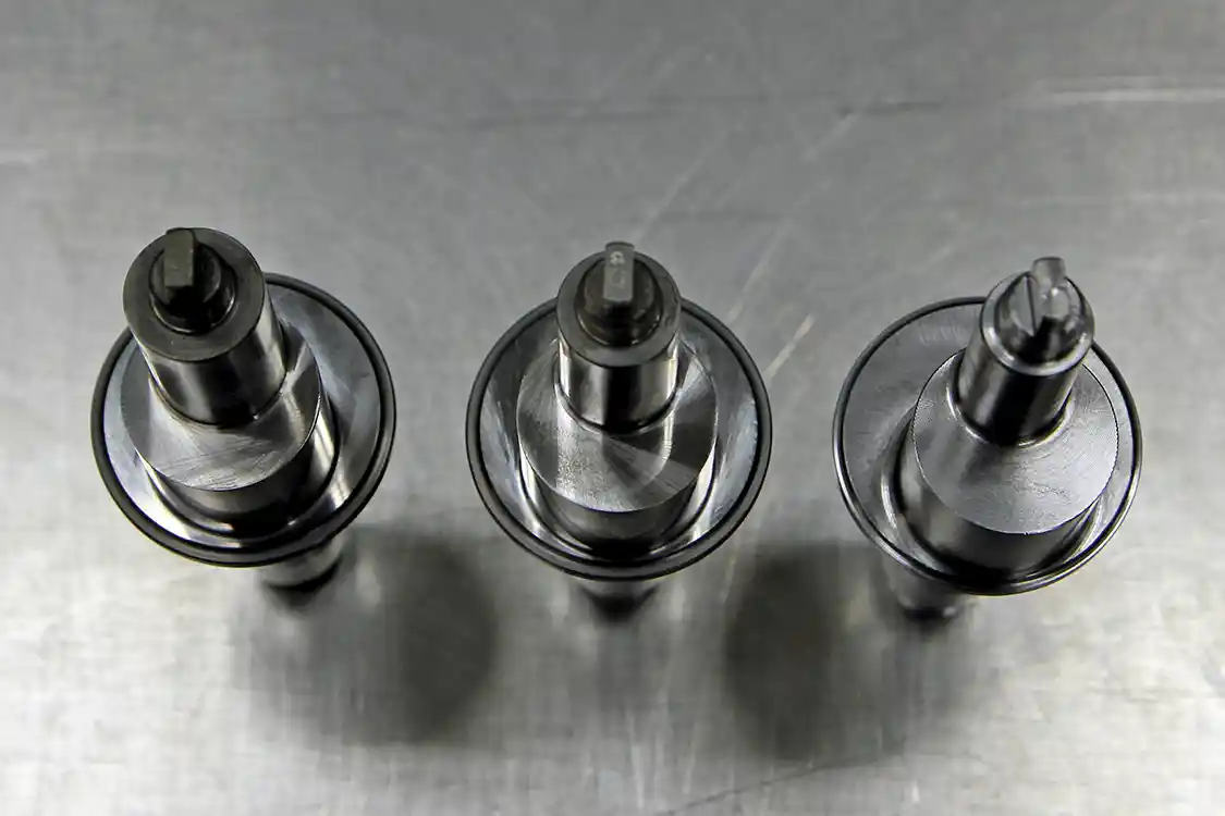 16. Here are three of the custom pump shafts S&amp;S uses for its “Stroker” pumps. Notice that the base circle of the cam has a larger stroke as you move from the shaft on the left to the larger ones in the center and on the right. These are the 10mm, 12mm and 14mm shafts (from left to right) used in their high performance CP3 pumps.
