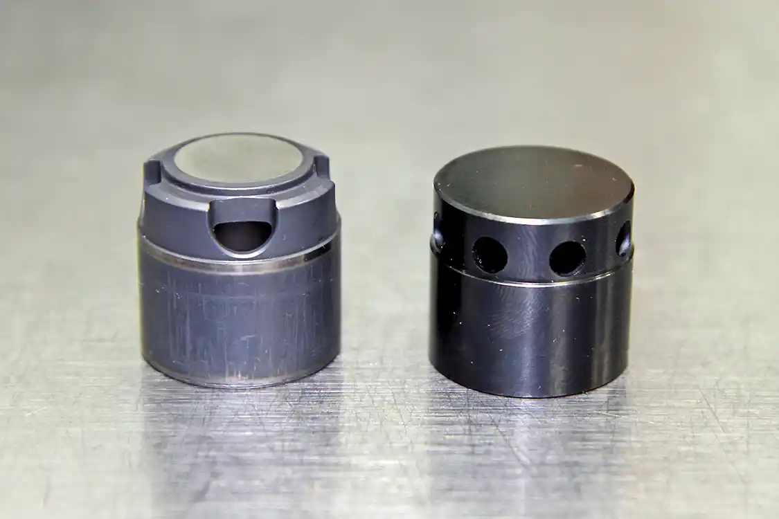 17. On the left is a stock CP3 cam bucket that is used in a standard stroke pump while the bucket on the right is the custom designed unit that S&amp;S uses for their 12mm and 14mm pumps. They use a modified factory bucket for their 10mm pump.