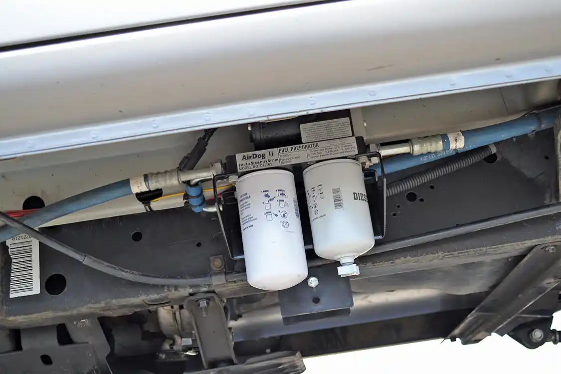 A 165 gallon-per-hour lift pump supports the 5.9L Cummins. Mounted low along the frame, the aftermarket lift pump was needed to support the rest of the Dodge's hopped-up injection system.
