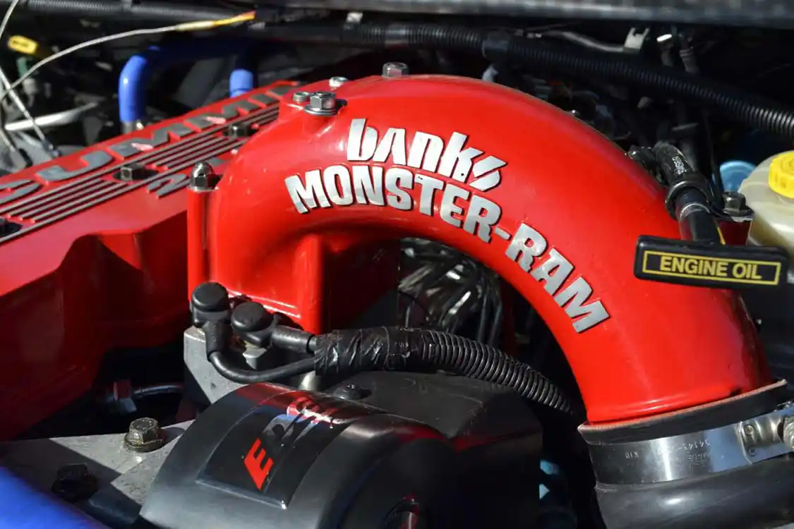 In addition to the intake and exhaust upgrades, airflow into the engine has been improved as well, with the addition of a <a href="https://www.bankspower.com/">Banks</a> Monster-Ram intake horn.