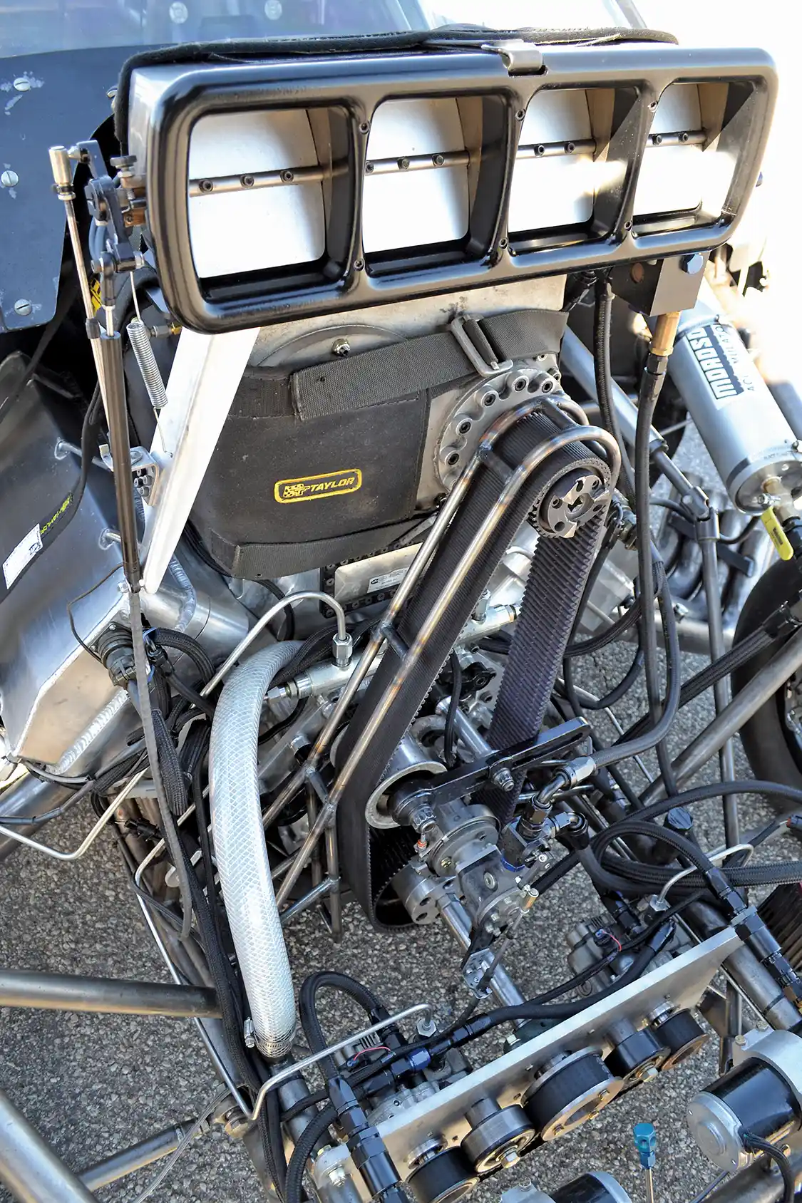 The heart of Brian Spooner's drag truck is this awesome 8.3L engine based upon a Top Fuel powerplant. It's visually different than any diesel engine we've ever seen before, and also a heck of a lot louder. With an estimated 2,000 horsepower and 3,500 lb-ft of torque, saying that it's a monster is an understatement.