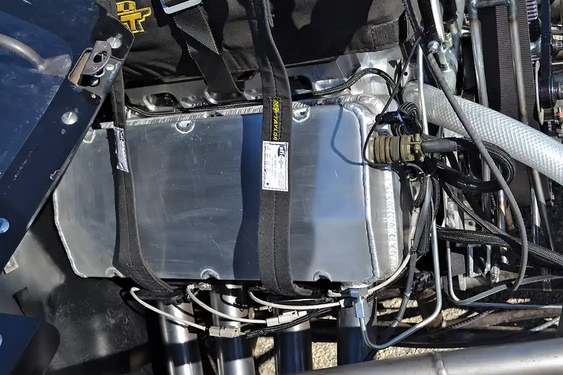 There's a lot of magic going on under the valve cover of this one-of-a-kind diesel. What we do know is that the head is loosely based on a hemi design, with 500-percent <a href="https://www.dmaxengines.com/">Duramax</a> injectors installed in place of spark plugs. There's also no combustion chamber, and the engine runs diesel pistons with bowls instead of hemi gas pistons.