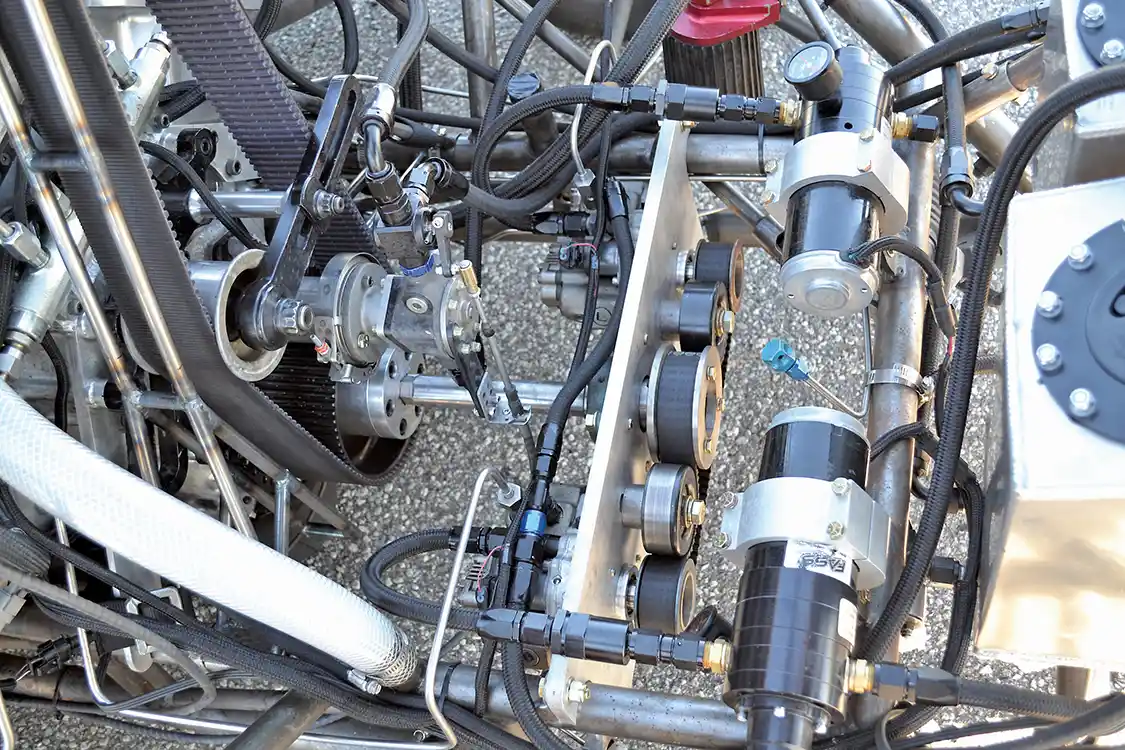 Those enormous injectors require a lot of support, so twin <a href="https://fassride.com/">FASS</a> 260-gph lift pumps send plenty of fuel to multiple 12mm stroker CP3 pumps built by <a href="https://www.exergyperformance.com/">Exergy Engineering</a>. The CP3s are also driven off of a separate crank drive that was custom built for this application.
