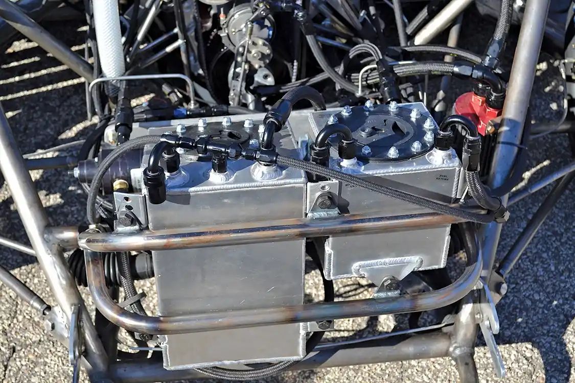 The twin tanks up front are for diesel fuel, and a water-soluble oil, which is injected into the engine just like water/methanol would be, to keep EGT under control.