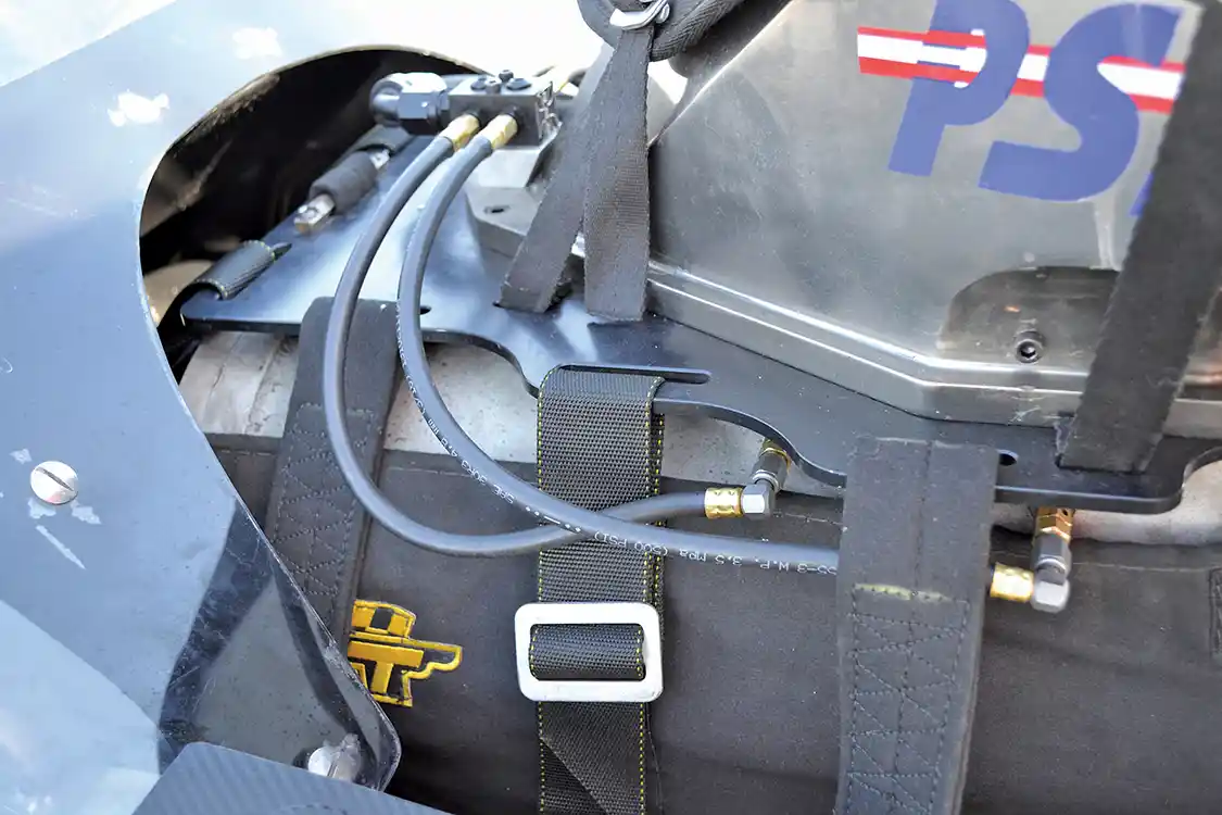 The big PSI 206D screw blower takes more power than a turbo to drive, but is capable of instant boost as soon as the throttle is matted. The four-butterfly hat is also from PSI, while the lines under the hat are for the water/oil injection.