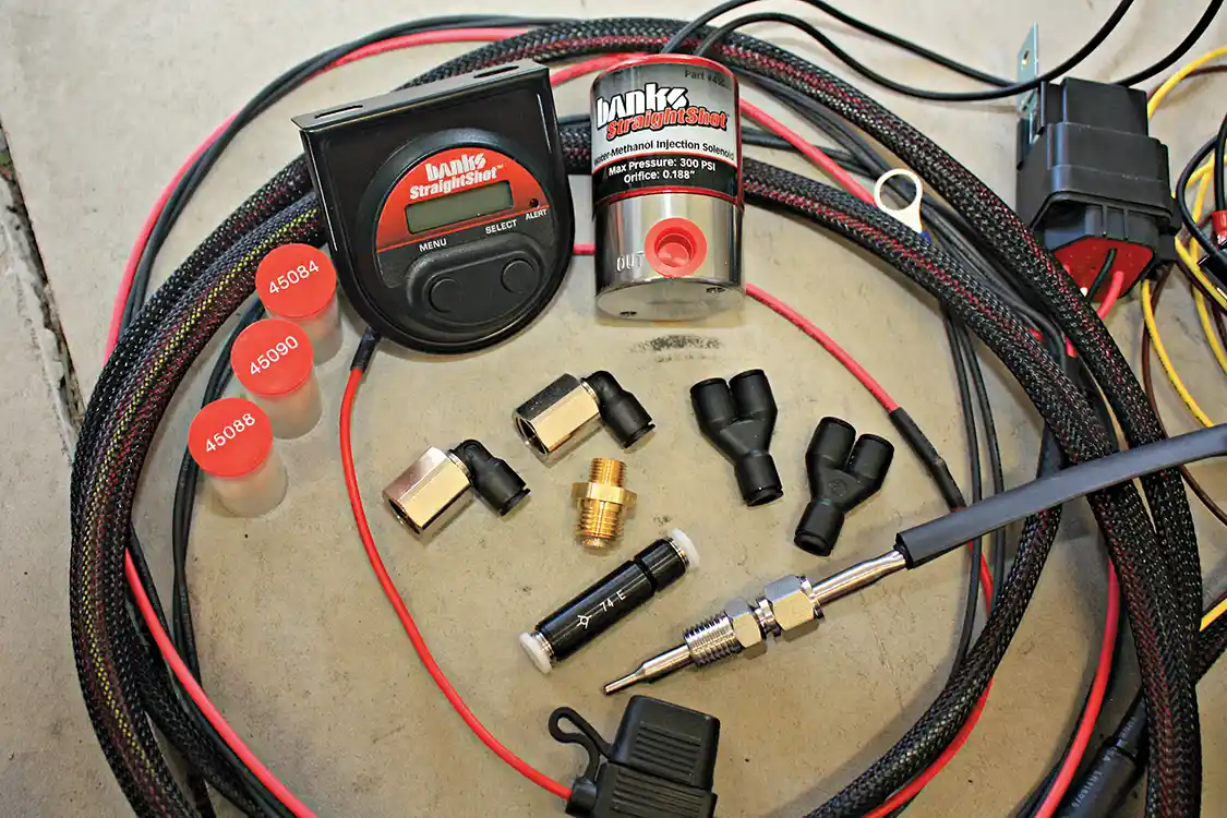 16. The Banks Double Shot Water Methanol system uses a compact digital controller to allow full command of the soon to be installed dual stage injection nozzles. The gauge will also be used to display boost, throttle percentage, EGTs, and injection rate. Four nozzles sizes are included to help dial in the system to each vehicles specific need.