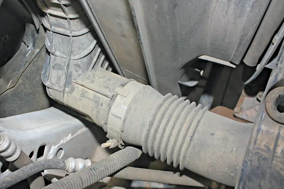 7. On this 2005 model year truck, the driver side (cold side) intercooler pipe is actually made of a plastic that has been known to blow out under heavy load and high boost applications. Just one more reason to upgrade to the mandrel bent 3.5-inch steel pipes included with the Technicooler kit.