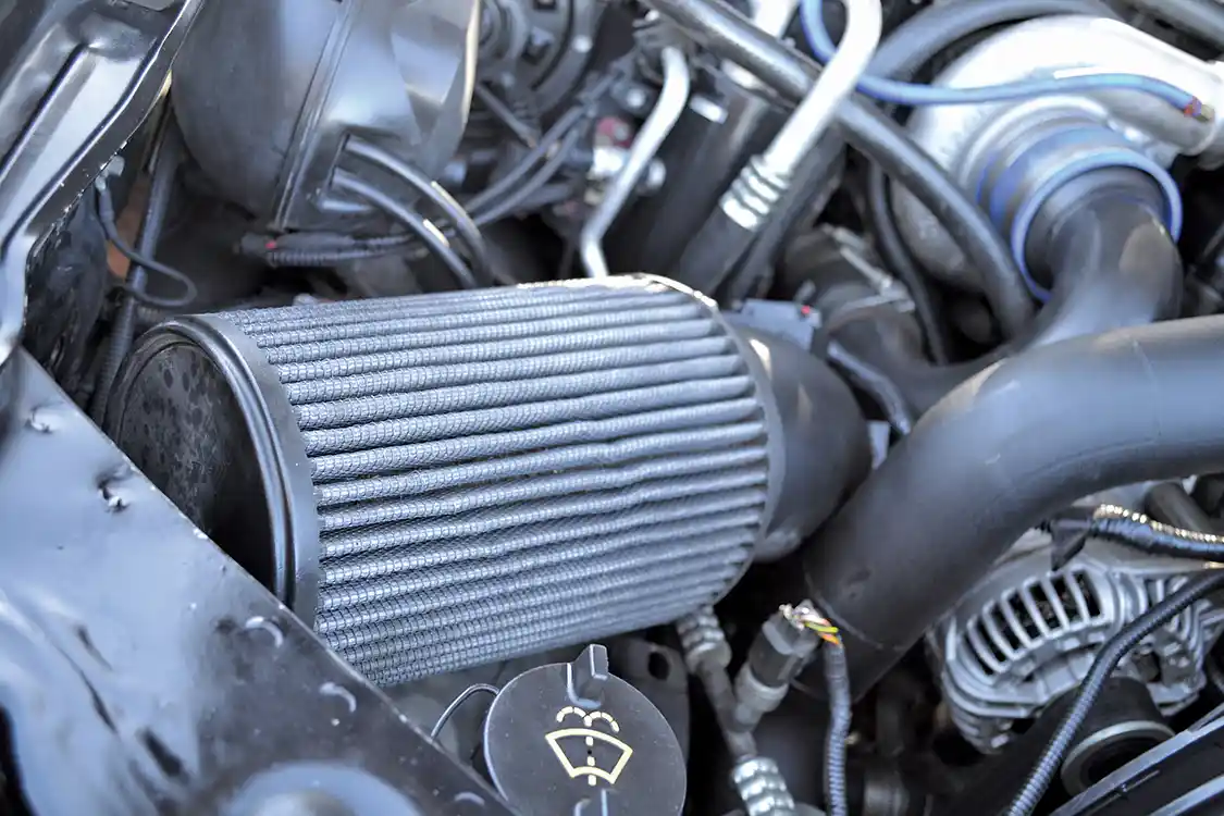 The enormous <a href="https://afepower.com/">aFe</a> air filter is the first thing that most people spot when they see the engine, which feeds air to a 75mm S400 turbocharger that has been modified by Destroked.
