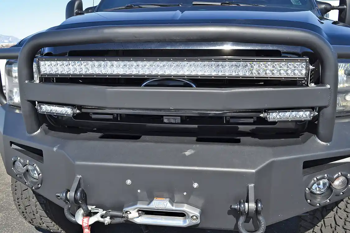 Since Brig occasionally goes off-road (although you'd never know it by the condition of the truck) a large LED light bar from <a href="https://www.rigidindustries.com/">Rigid Industries</a>, a <a href="https://fabfours.com/">Fab Fours</a> bumper and <a href="https://www.warn.com/">Warn</a> winch keep the Harley truck out of trouble.