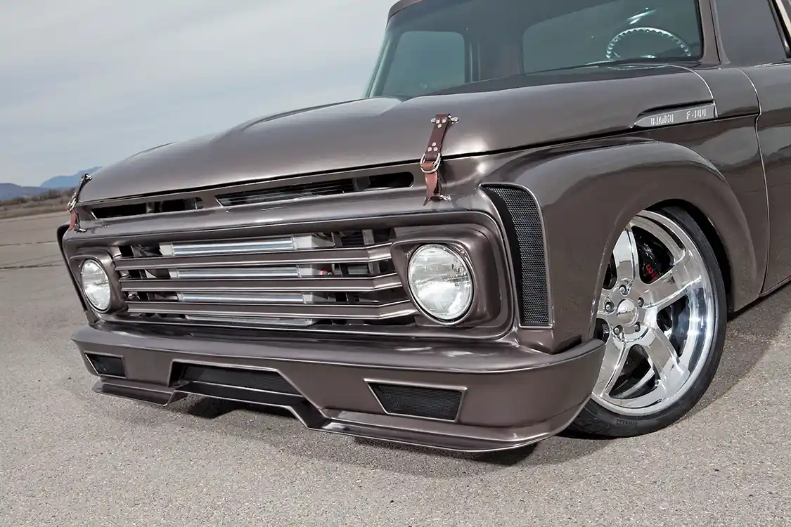 Instead of slamming his classic Ford on the ground, Weaver moved the front suspension forward and the fenders up on the truck to give the truck its one-of-a-kind stance.