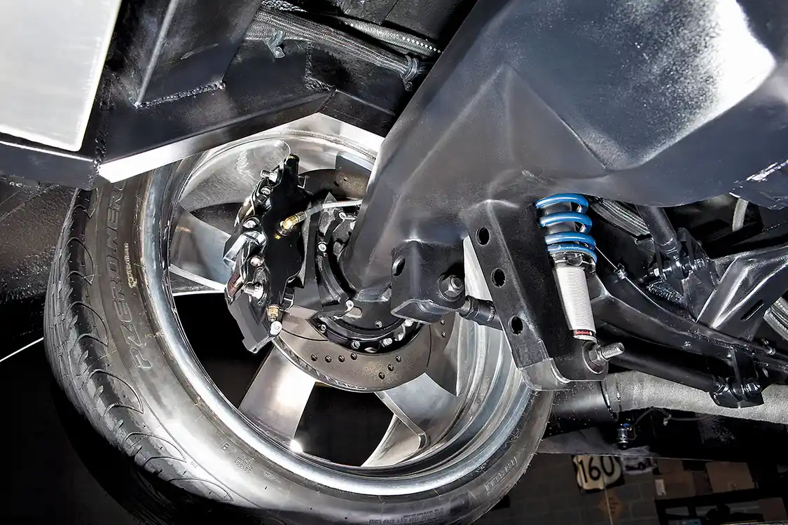 The <a href="https://www.ford.com/">Ford</a> was backhalfed with a custom 4-link to help clear the massive tires and to make sure all the Cummins power makes it to the pavement through the narrowed 9-inch rearend.