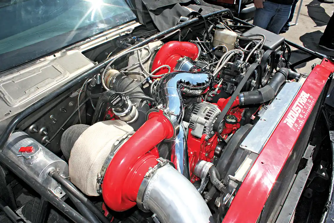 The Duramax powered <a href="https://www.industrialinjection.com/">Industrial Injection</a> race truck was built for a couple reasons, first and foremost, product development; second, to break records and third, to help market those same record breaking products being developed. With virtually anything and everything you can do to a Duramax power plant bolted to this thing, those giant turbos, triple CP3s and giant Cobra injectors have already done north of 1,800 hp on the chassis dyno. The quest for 2,000 hp continues.