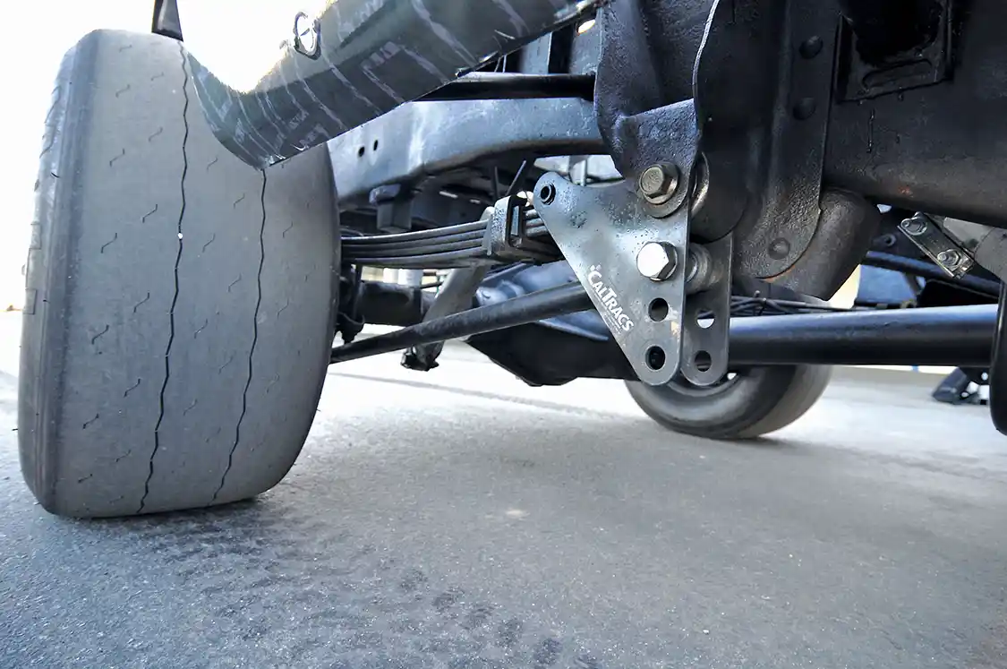 CalTracs traction bars are essential to reducing axle wrap and increasing traction. Of course, the race slicks are a big part of the traction equation too.