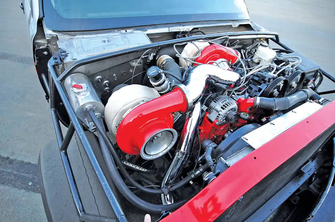 The turbo system is a custom setup with Industrial Injection S480/S510 compound turbo combo.