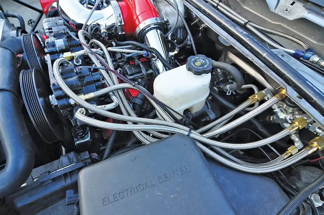 The triple Dragon fire CP3 pumps at the front of the engine feed fuel to a distribution/accumulation block. The fuel is then passed on to the injectors to meet this engine’s needs at full power.