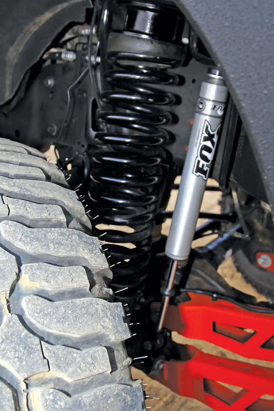 The 10-inch 4-link lift is achieved using a kit from McGaughys. Future mod’s include coilover shocks from King Shock which will replace the current coils and stock mount shocks.