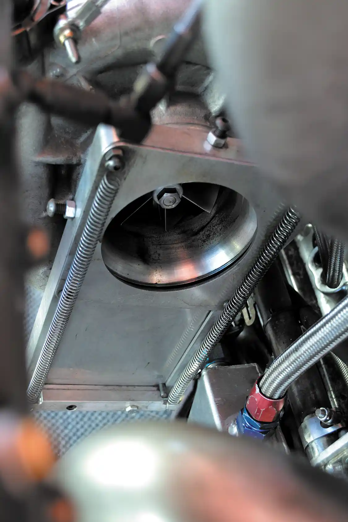 Safety is integrated into the turbo system, just like the rest of the engine. If John ever gets out of control, he can use this air shutoff to cut the engine's power.
