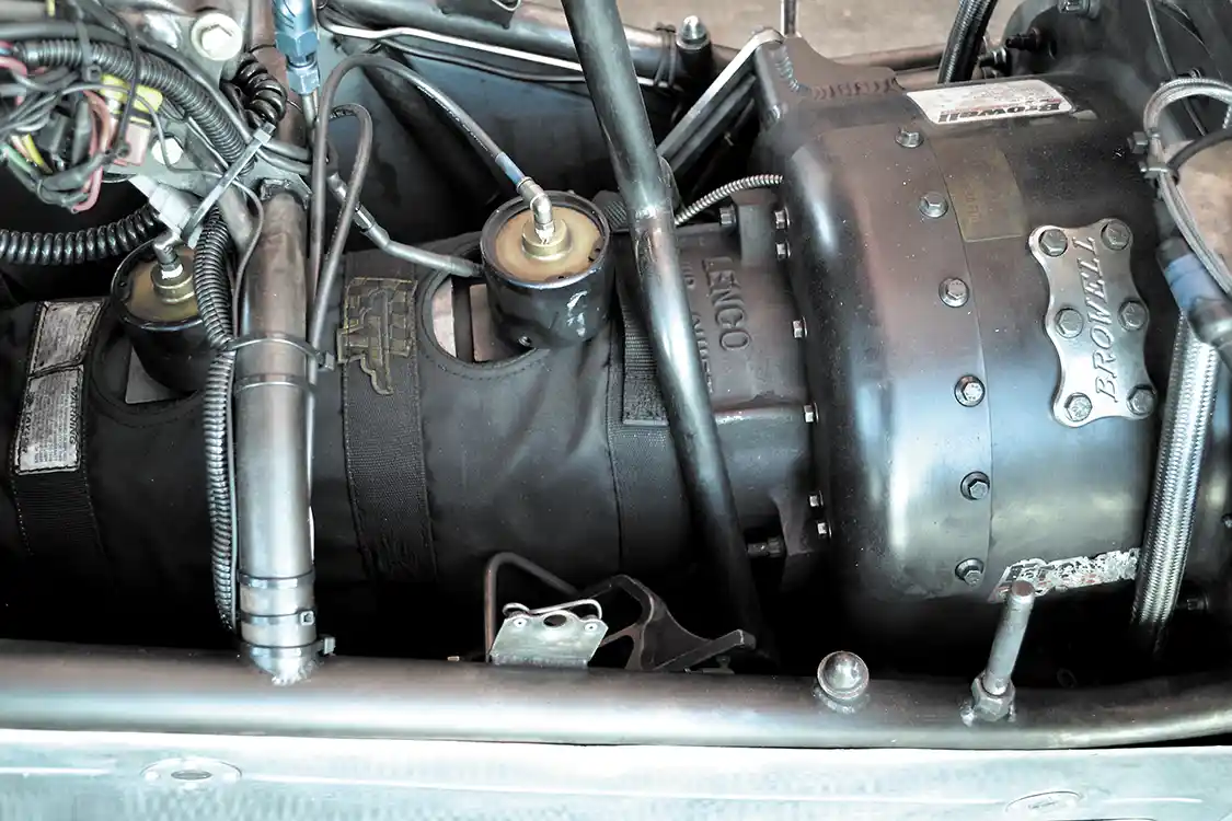 Moving away from a diesel transmission meant going to a strong and light Lenco CS1 three speed transmission. Connecting the Lenco to the engine is a <a href="https://www.browellbellhousing.com/">Browell</a> bell housing and a 4-disc 10.7-inch <a href="https://www.crower.com/">Crower</a> pedal clutch.