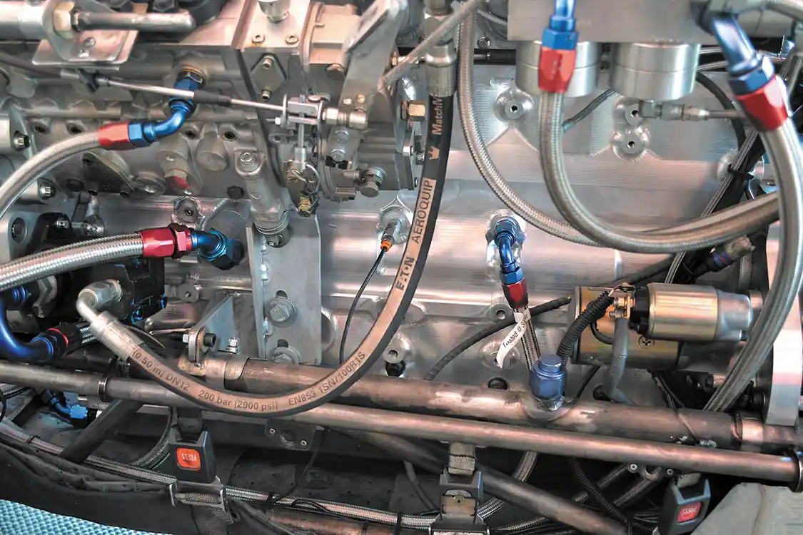 The Cummins aluminum block cuts more than 100 pounds of weight as compared to iron, and is filled with only the best parts. A 6.7L crank, Scheid connecting rods, and 12:1 compression <a href="https://ariaspistons.com/">Arias</a> pistons give the engine a 6.4L displacement. Upper-end parts include a Scheid roller camshaft and 12-valve head from <a href="https://hamiltoncams.com/">Hamilton Cams</a>, which flows nearly twice as much air as a stock cylinder head.