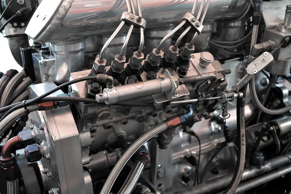 Most p-pump engines are based upon the <a href="https://www.bosch.us/">Bosch</a> P7100 pump, but John's engine uses a highly modified P8600 unit, with 14mm plungers, a custom pump camshaft, and coatings throughout the unit. Built by Scheid Diesel, the injection pump is capable of more than 1,000 cc of fuel flow.
