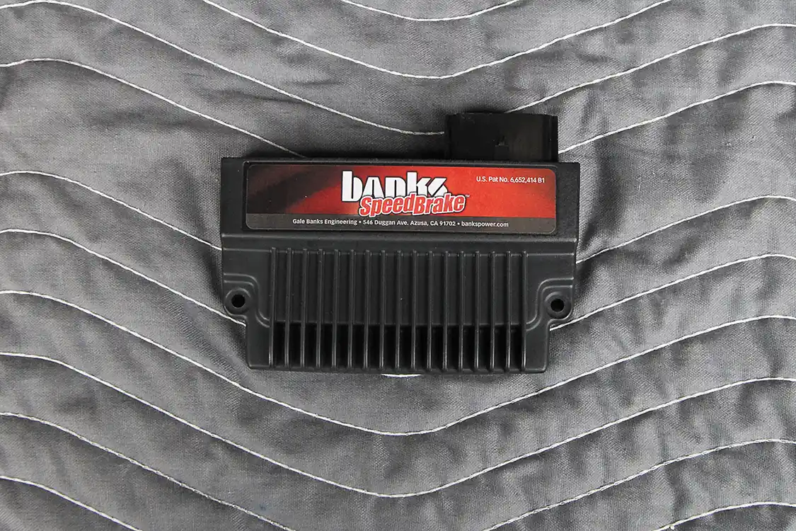 2. Here’s the brains behind the SpeedBrake, and it mounts safely under the hood. The SpeedBrake can be used as a freestanding unit or for even more control, it can be connected to the Banks iQ tuner.