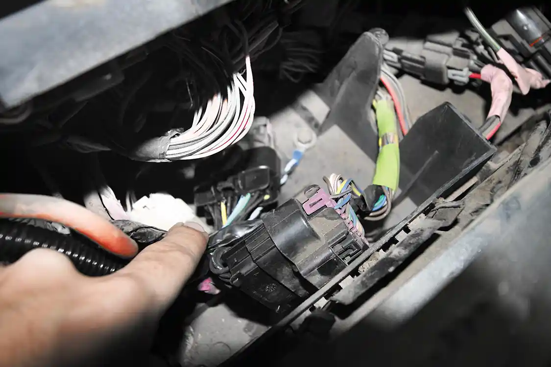9. Now you’ll need to plug the Banks connectors inline between these two OEM connectors underneath the fuse box.